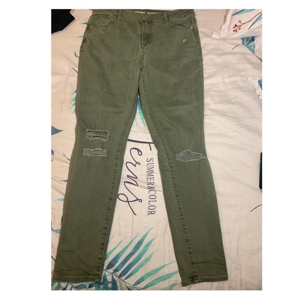 Ripped green jeans